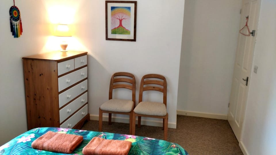 Bed, Photo of the whole room, Seating area, Bedroom, towels, towels, wardrobe