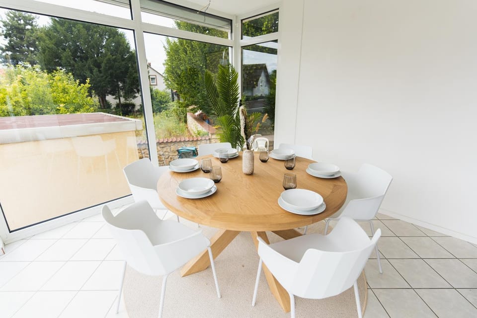 Property building, View (from property/room), Living room, Seating area, Dining area