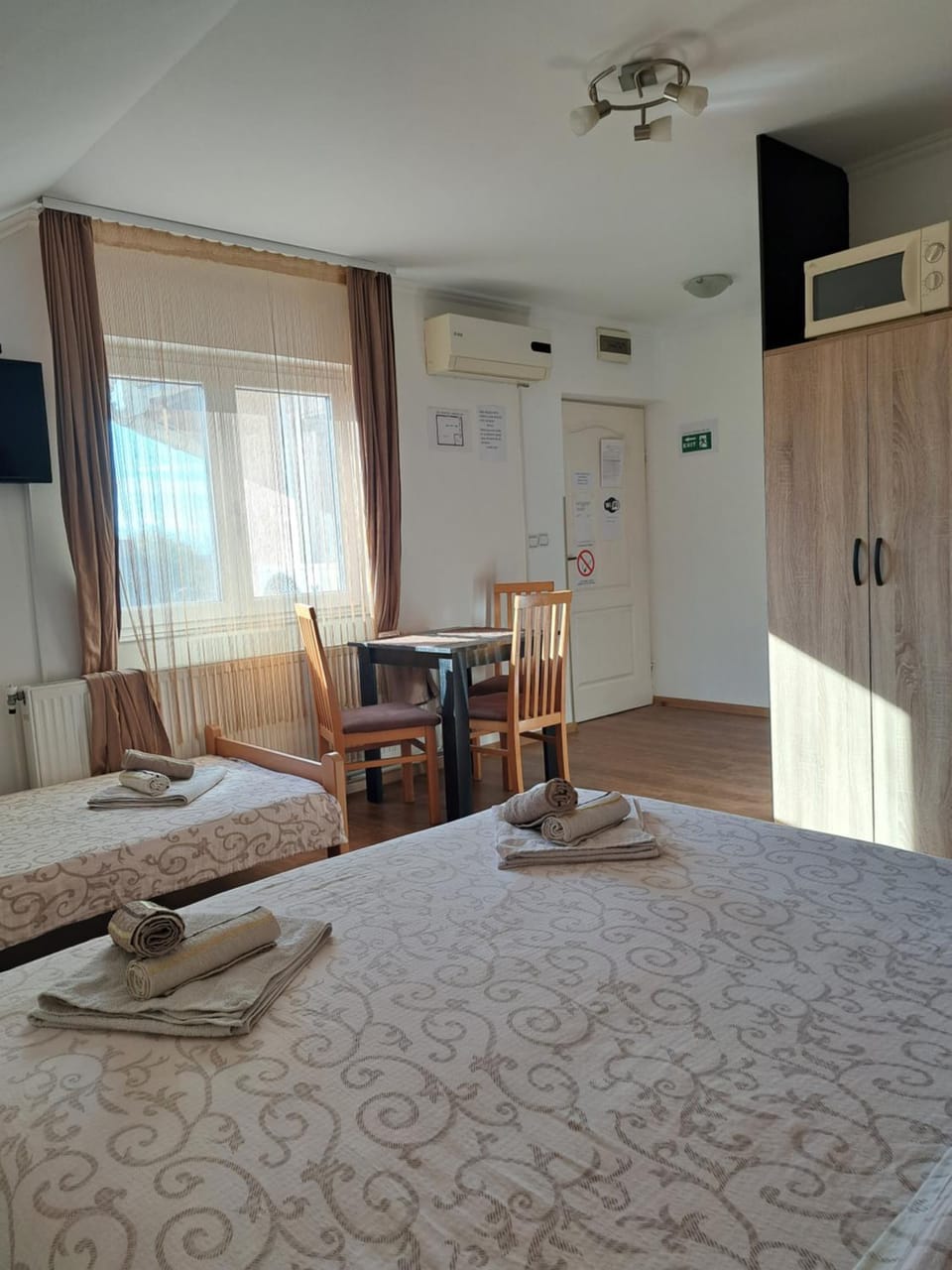 Bed, wardrobe, air conditioner