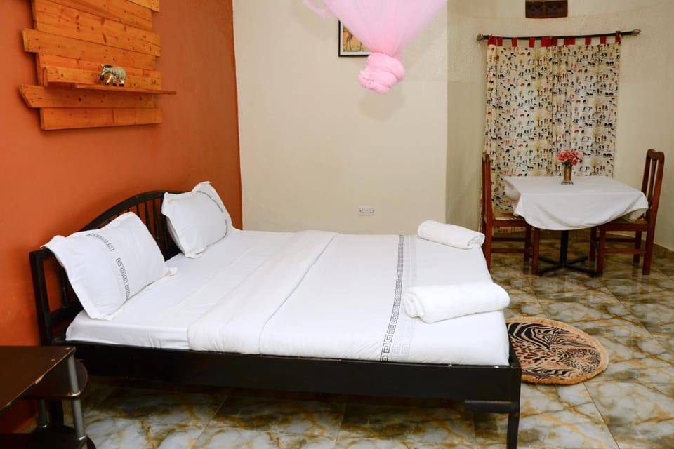 Bed, Seating area, Dining area, Bedroom