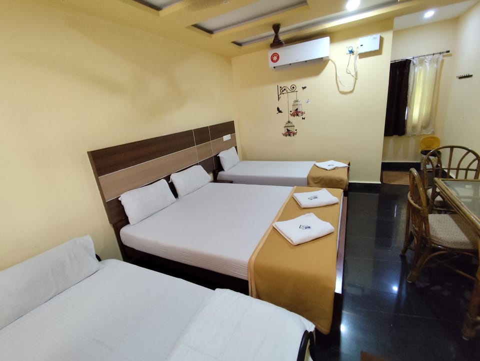 Bed, Bedroom, fireplace, towels, air conditioner
