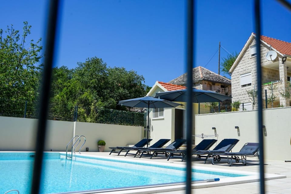 Patio, Day, Pool view, Swimming pool, sunbed