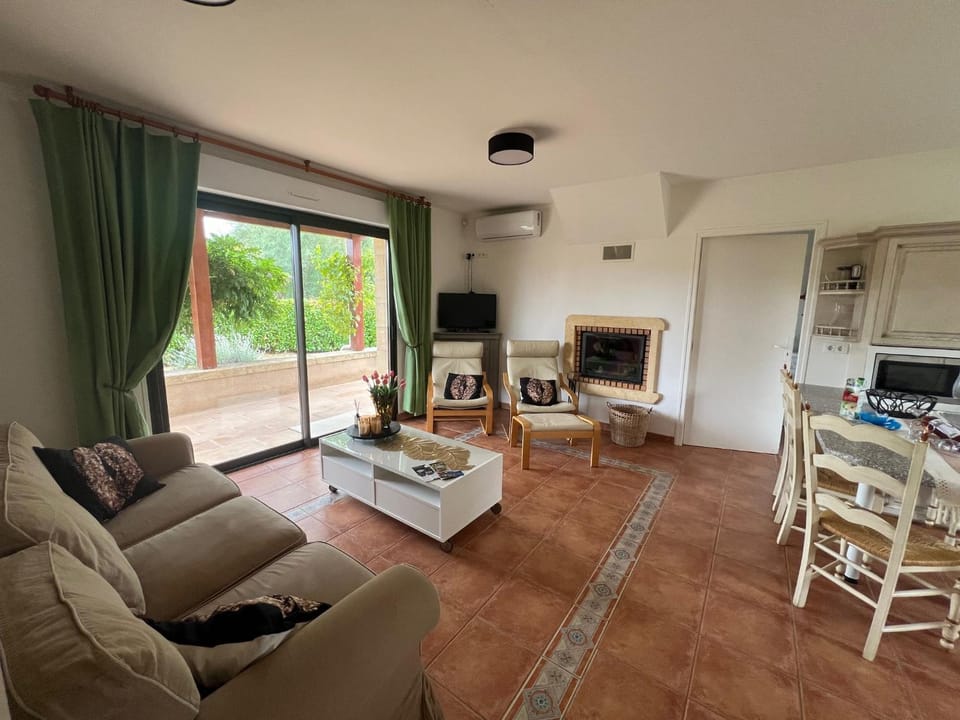 TV and multimedia, View (from property/room), Seating area, fireplace, air conditioner