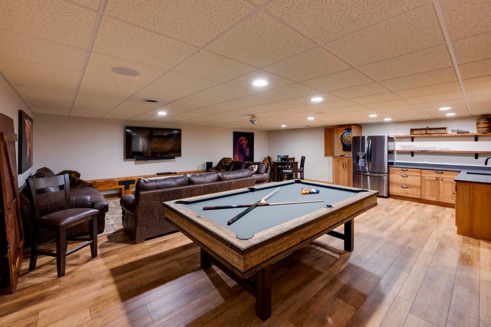 Game Room + Patio + Entertainment Area House in Iowa