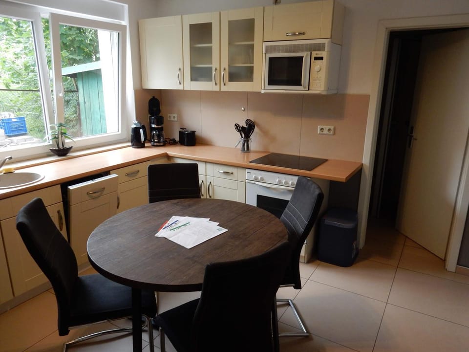 Kitchen or kitchenette, Dining area, dishwasher, microwave, oven, toaster
