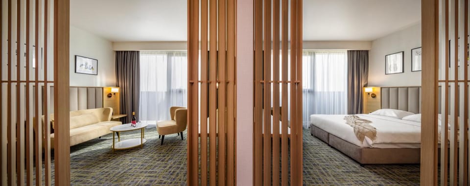 Bed, Living room, Seating area, Bedroom