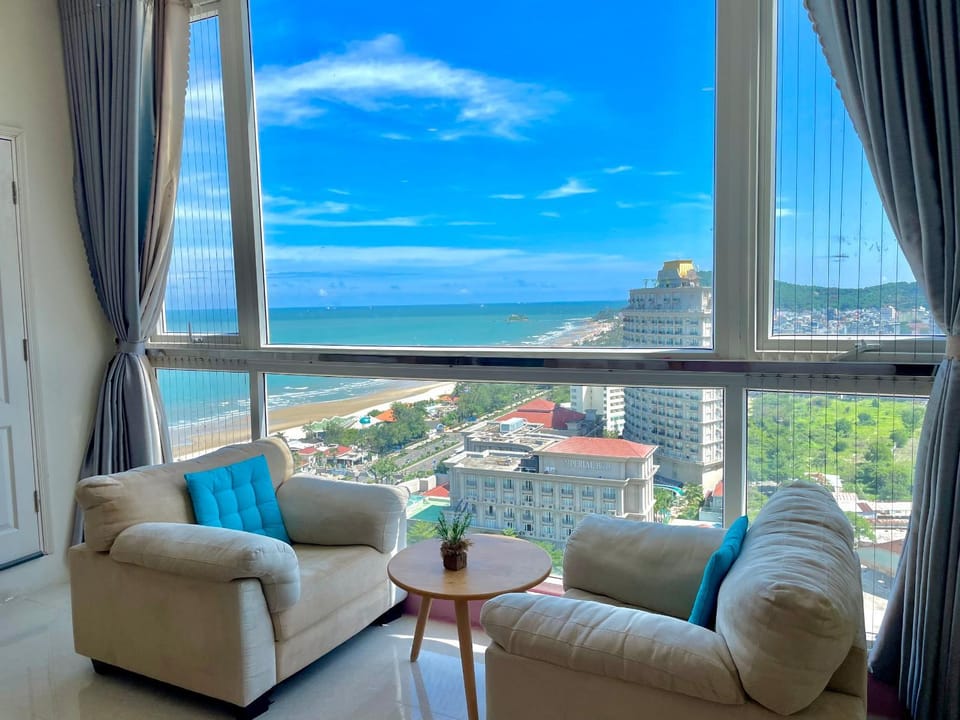 Day, View (from property/room), Living room, Seating area, Mountain view, Sea view
