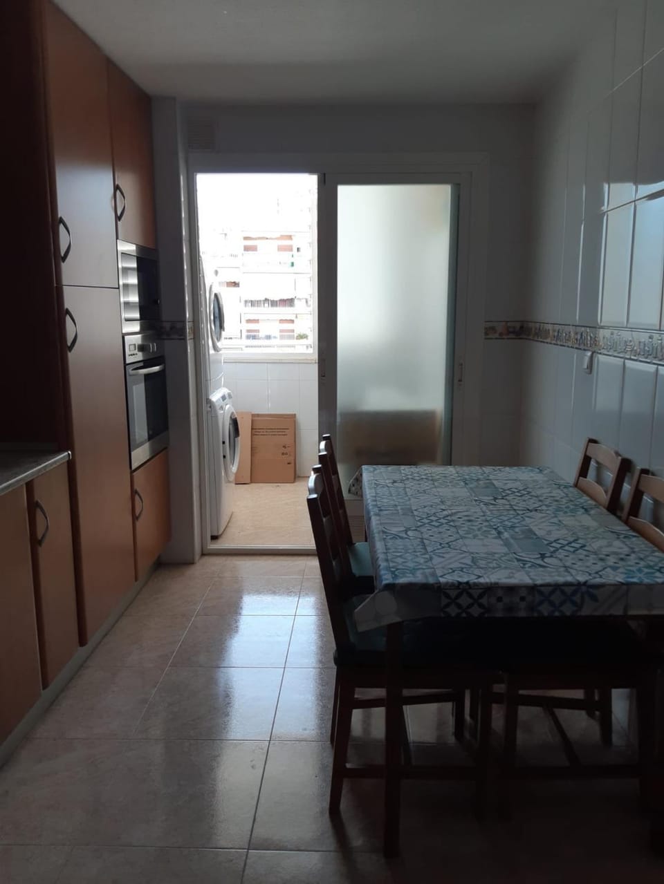 Kitchen or kitchenette, washing machine