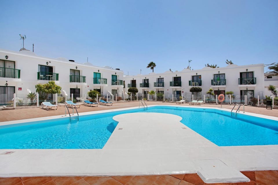 Property building, Living room, Swimming pool