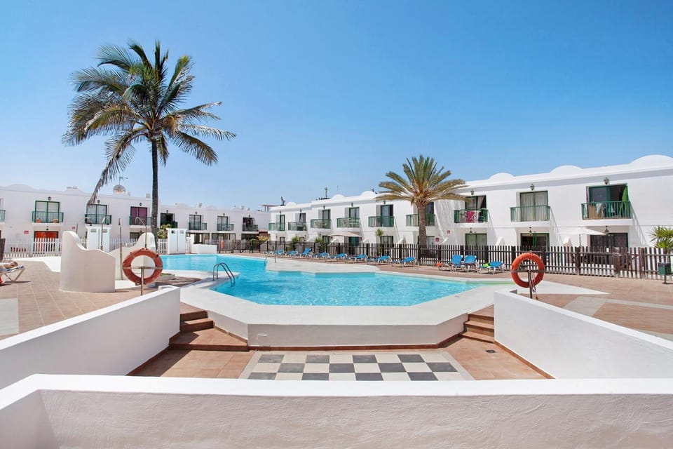 Property building, Living room, Swimming pool