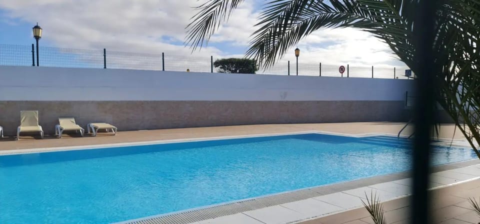 Property building, Living room, Swimming pool