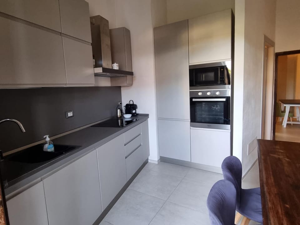 Kitchen or kitchenette, microwave, oven, stove, kitchen