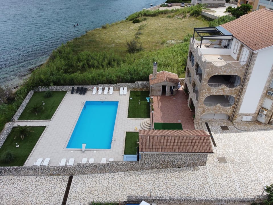 Property building, Day, Neighbourhood, View (from property/room), Pool view, Sea view, Swimming pool