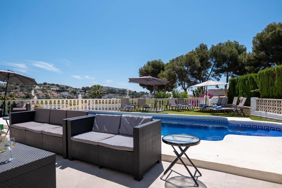 Property building, Living room, Mountain view, Pool view, sunbed