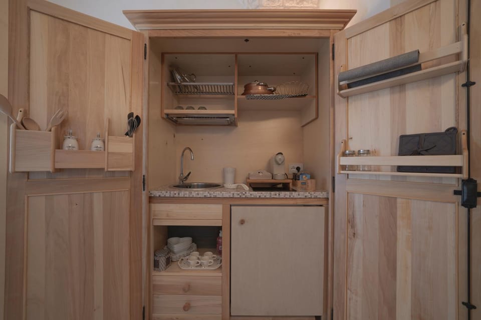 Kitchen or kitchenette, stove, wardrobe