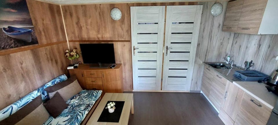 Mały domek w centrum Rowów House in Pomeranian Voivodeship