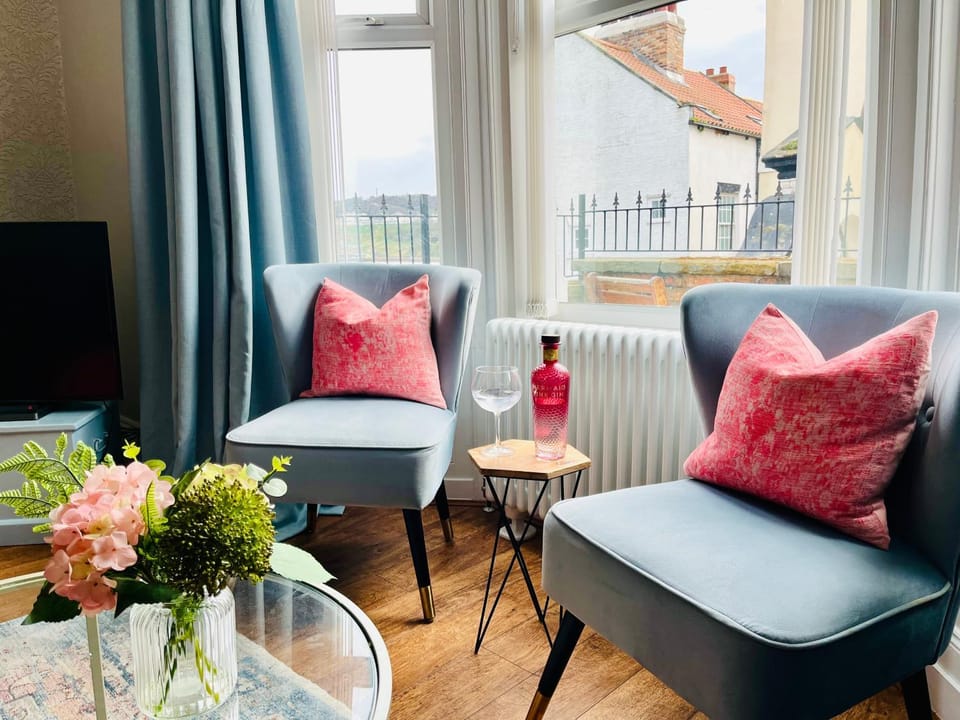 View (from property/room), Living room, Seating area, Sea view
