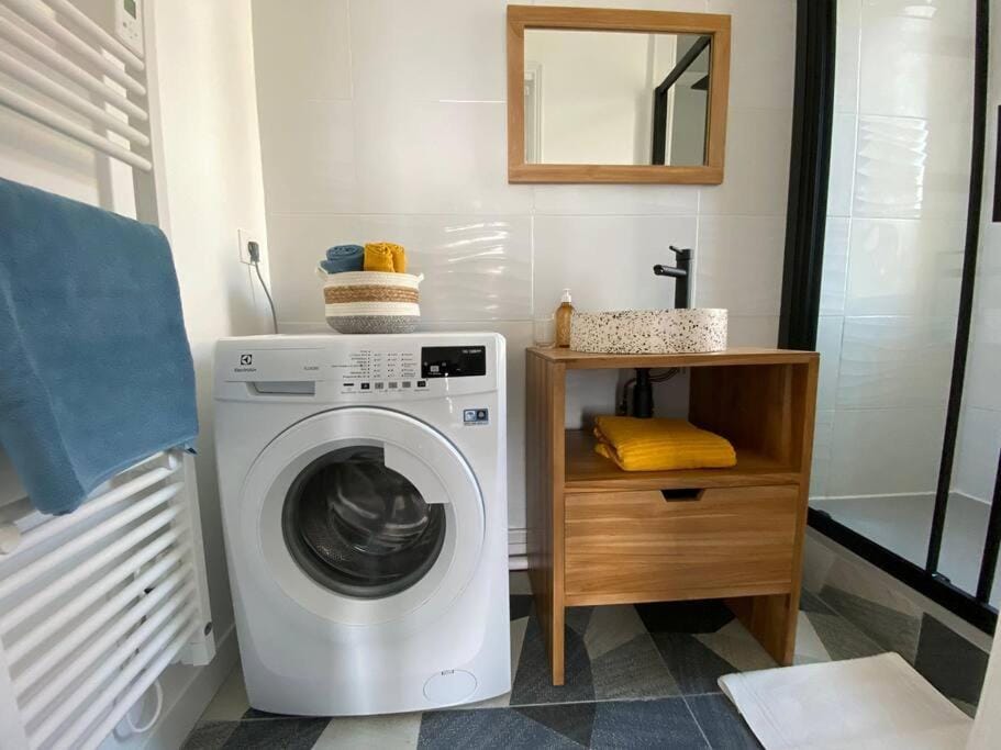 Bathroom, towels, washing machine, dryer