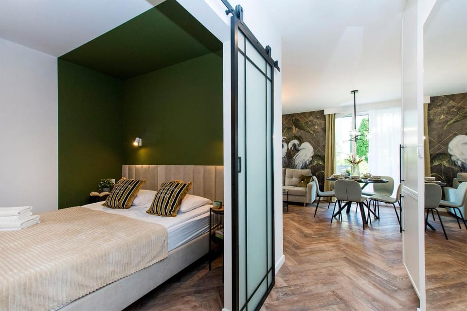 Bed, Living room, Seating area, Bedroom
