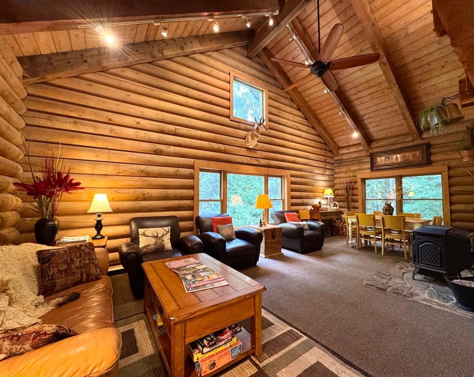 Natural landscape, View (from property/room), Living room, Seating area, Dining area, fireplace