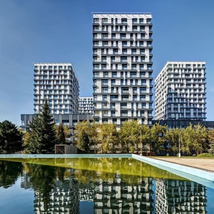 Property building, Day, Natural landscape, City view, Pool view, Swimming pool