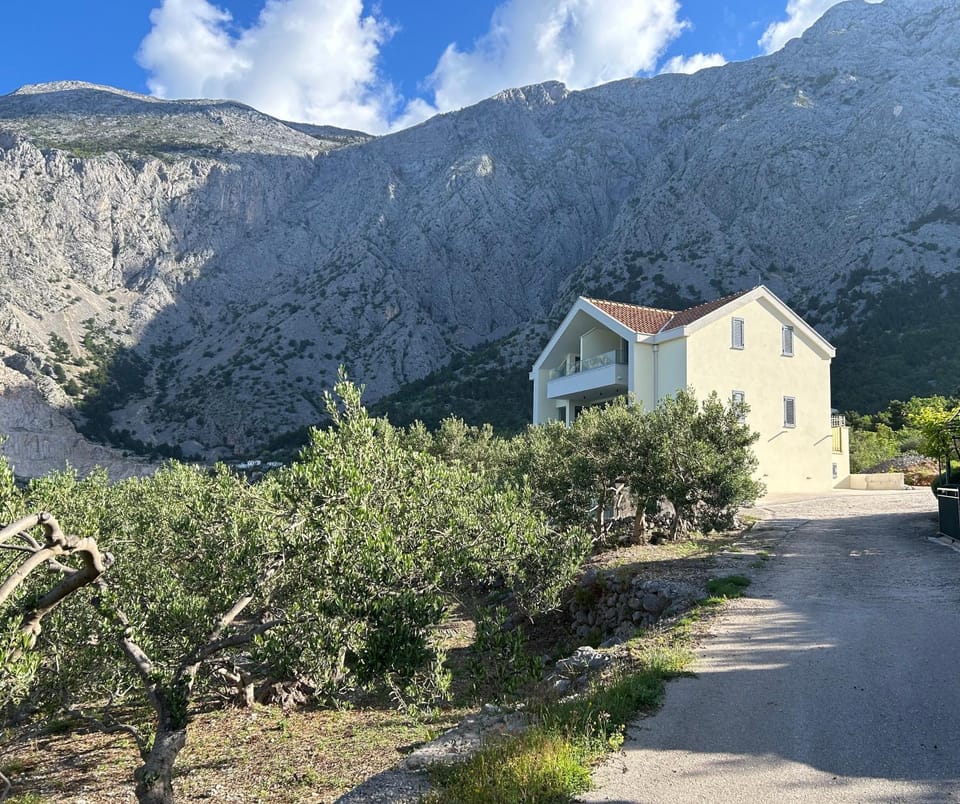 Property building, Spring, Day, Natural landscape, Mountain view