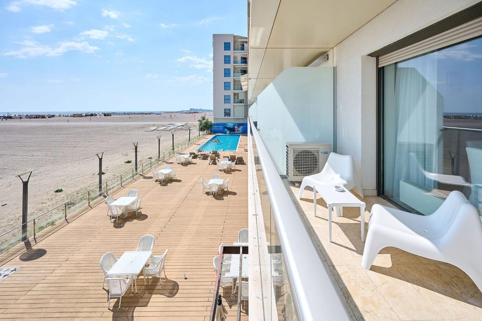 Property building, Day, View (from property/room), Balcony/Terrace, Beach, Swimming pool