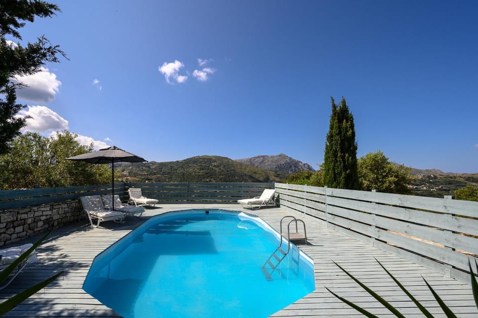 Nearby landmark, Day, Natural landscape, Mountain view, Pool view, Swimming pool, sunbed