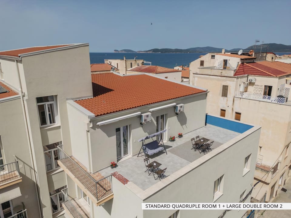 Property building, Patio, Day, Natural landscape, View (from property/room), Balcony/Terrace, Sea view, sunbed