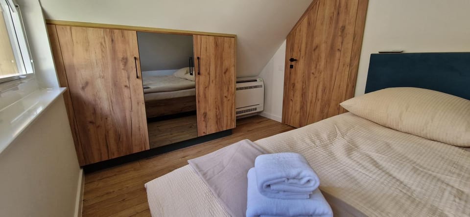 Bed, Photo of the whole room, Bedroom, towels, wardrobe, air conditioner