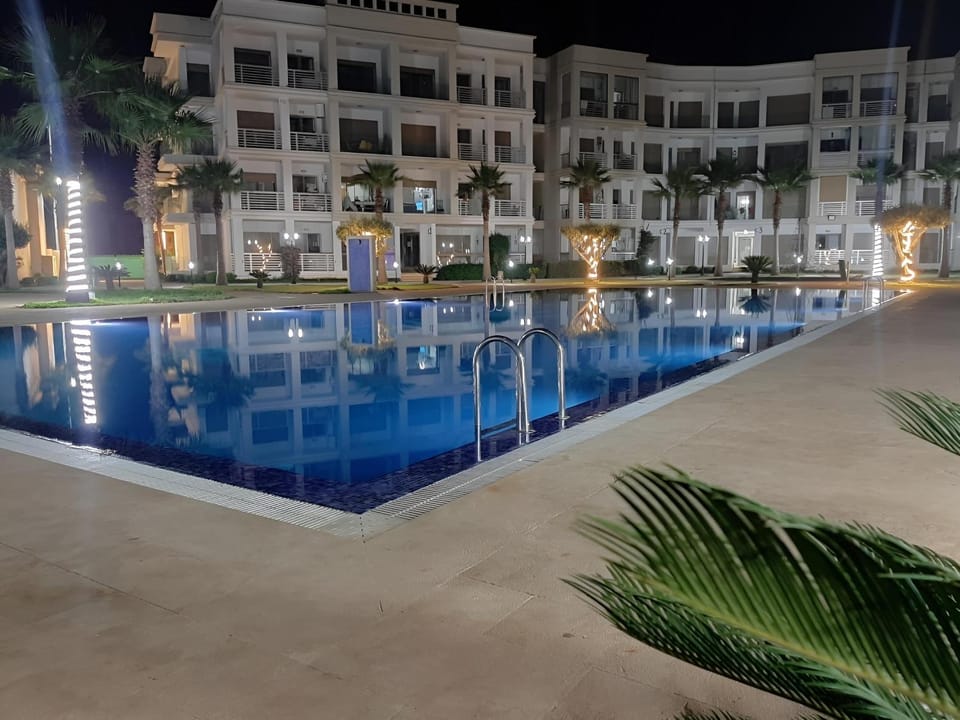 Property building, Night, Pool view, Swimming pool