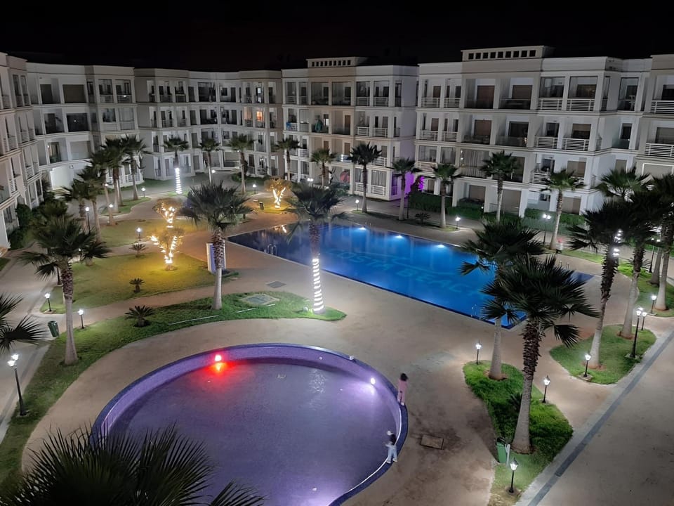 Property building, Night, Pool view, Swimming pool