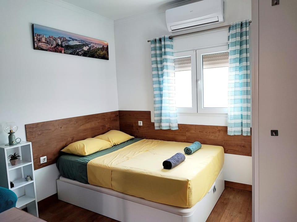 Bed, air conditioner
