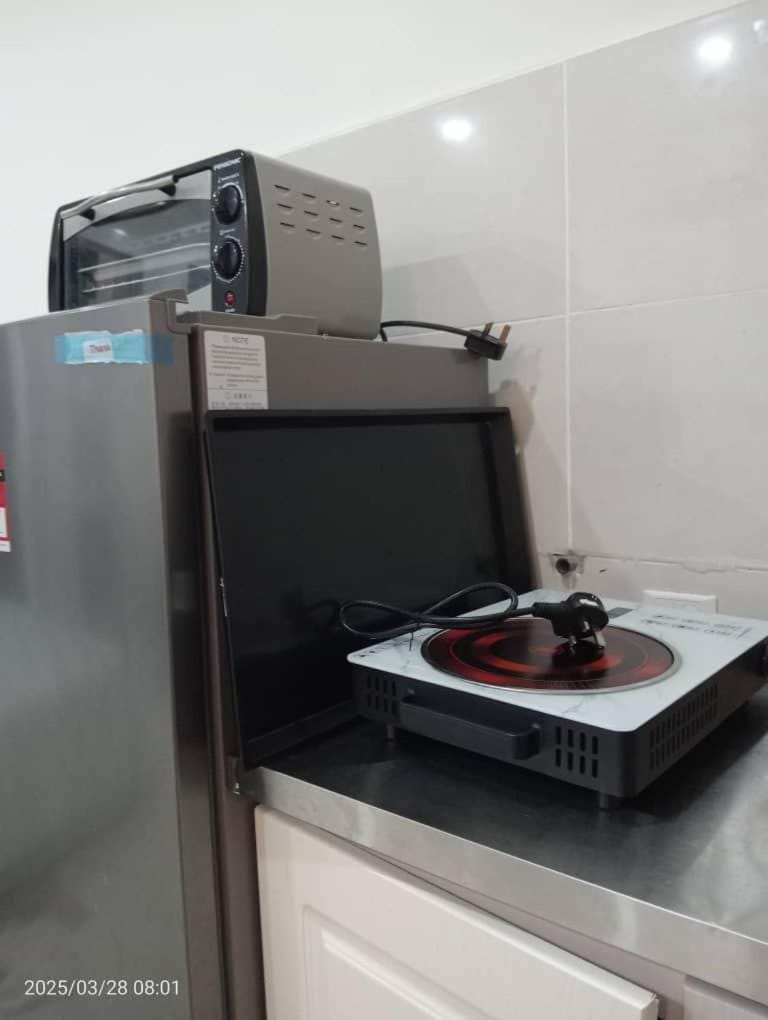 Kitchen or kitchenette, oven, toaster