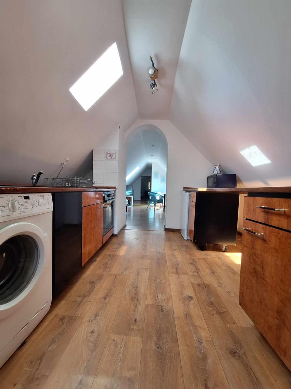 Kitchen or kitchenette, washing machine
