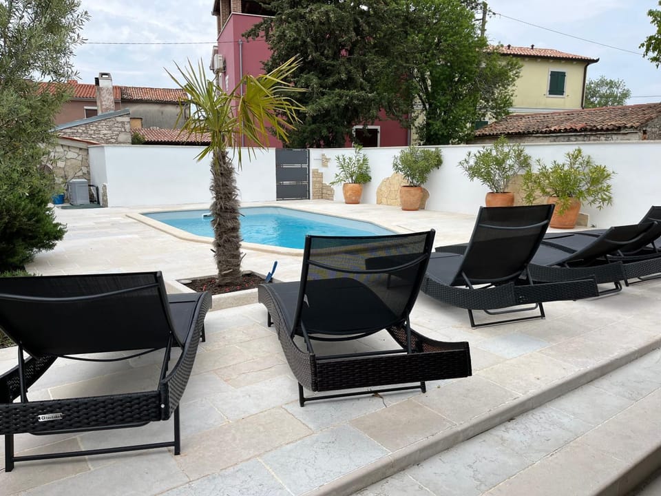 Patio, Pool view, Swimming pool, sunbed