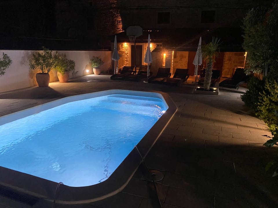 Swimming pool, sunbed