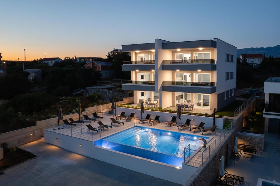 Property building, Night, Natural landscape, View (from property/room), Pool view, Swimming pool, sunbed