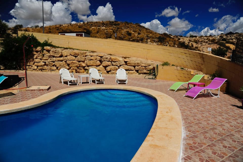 Natural landscape, Mountain view, Swimming pool, sunbed