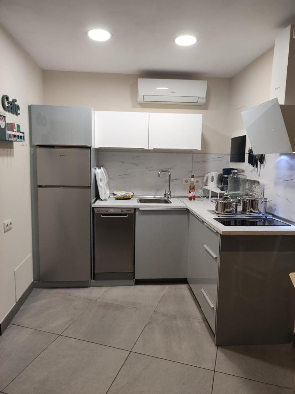 Kitchen or kitchenette, dishwasher, stove, toaster