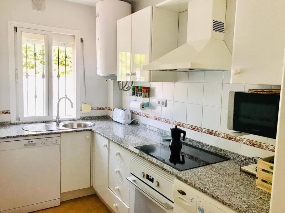 Apartamento con porche y piscina Apartment in Chiclana de la Frontera