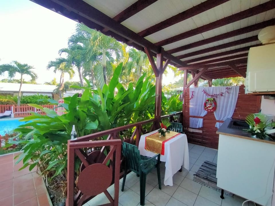 Patio, Day, Garden, View (from property/room), Balcony/Terrace, Dining area, Garden view, Pool view, Swimming pool