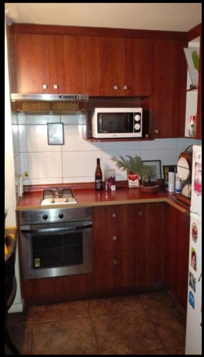 Kitchen or kitchenette, dishwasher, oven, stove