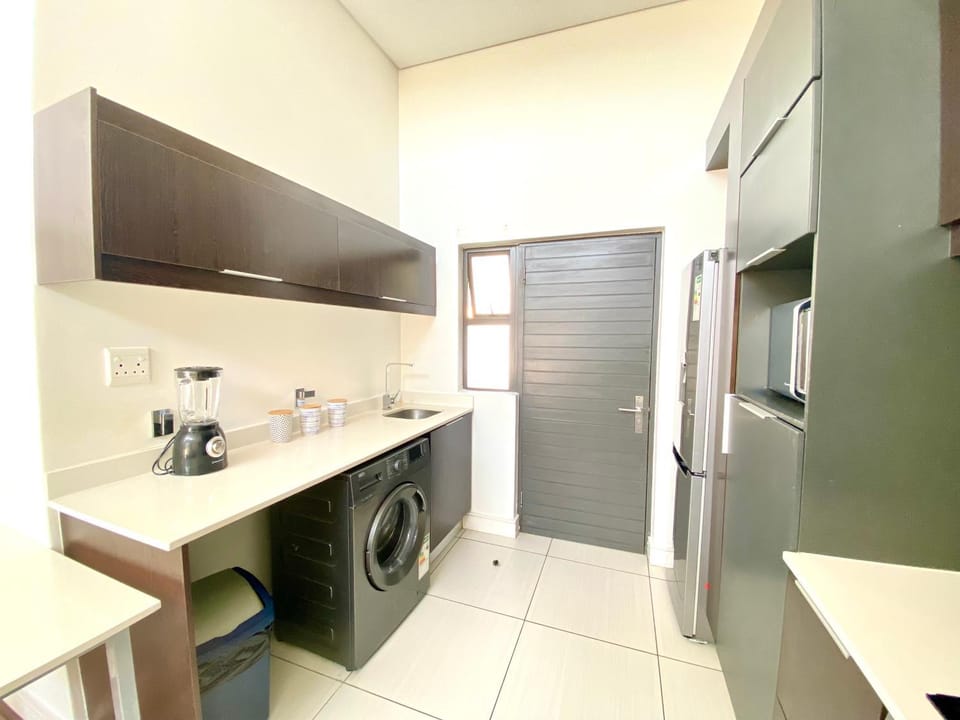 Kitchen or kitchenette, washing machine