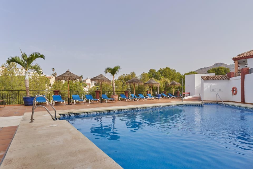 Property building, Living room, Swimming pool