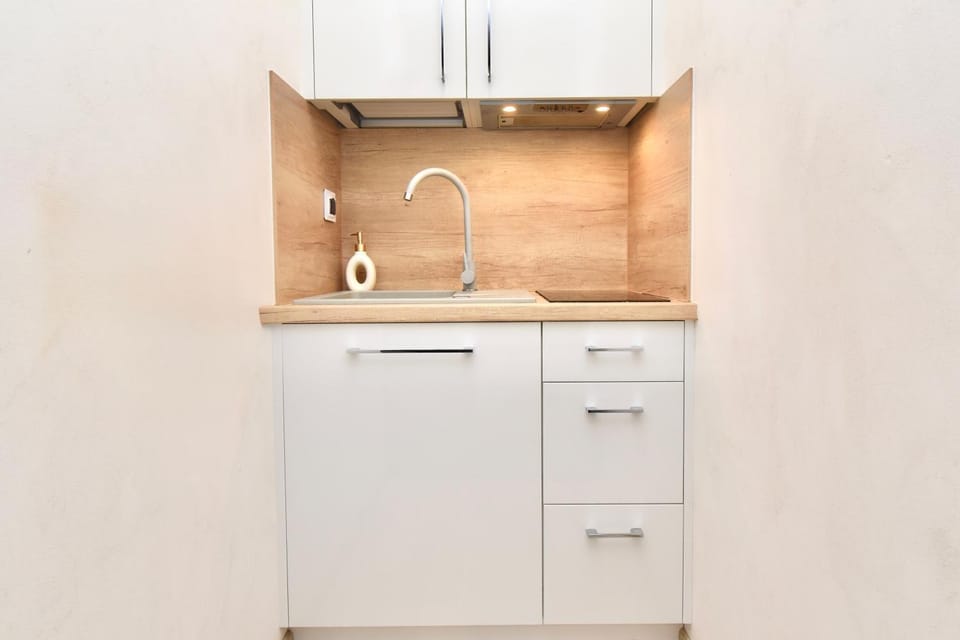 Kitchen or kitchenette, stove