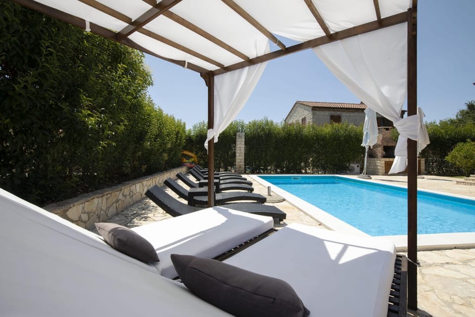 Patio, Day, Natural landscape, Pool view, Swimming pool, sunbed