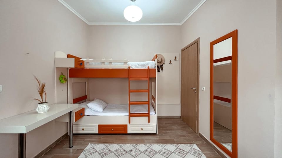 Photo of the whole room, bunk bed, wardrobe