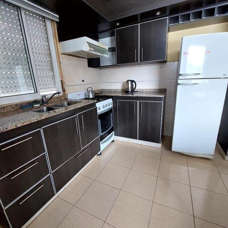 Kitchen or kitchenette, oven