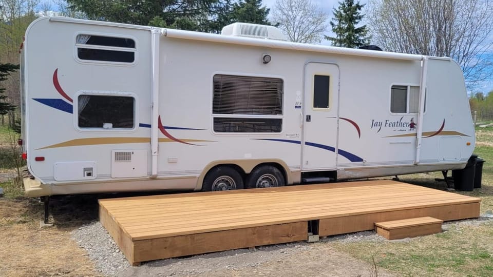 RV with Rocky Mountains View Campground/ 
RV Resort in British Columbia